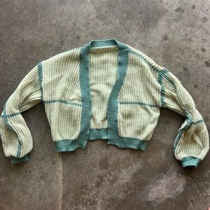 green cardigan sweater